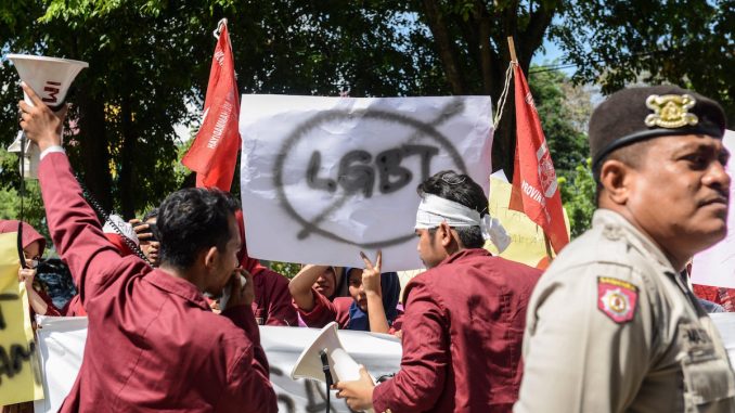 police detained transgender Aceh Indonesia