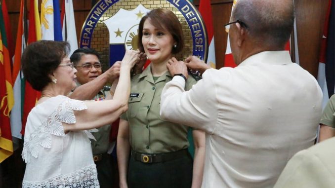 First transgender lawmaker joins military as reservist in the Philippines First-transgender-filipino-law-maker-gerladine-roman-joins-military-reservist-678x381